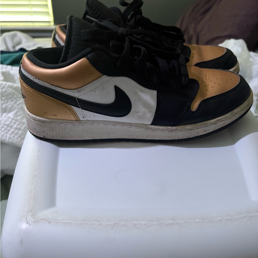 Nike Black, White, and Gold Sneakers